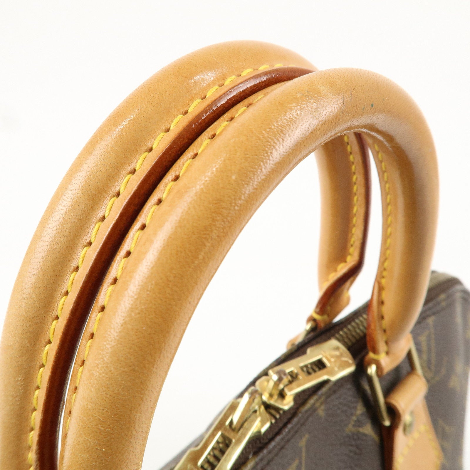 Louis Vuitton Monogram Alma Hand Bag Brown M51130