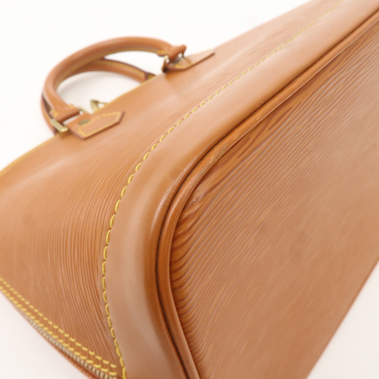 Louis Vuitton Epi Leather Alma Hand Bag Zipang Gold M52148
