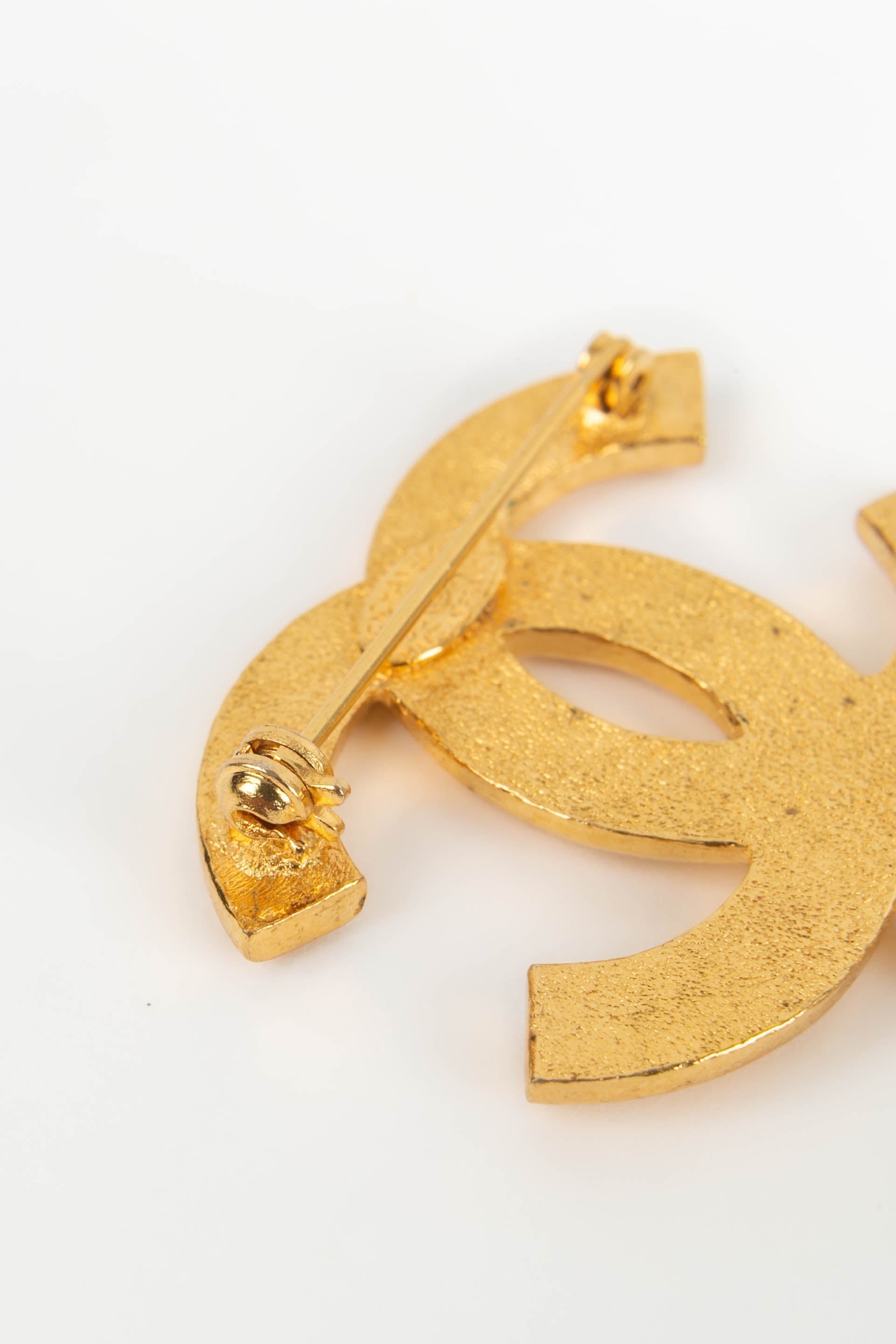 Broche charms Chanel 1995