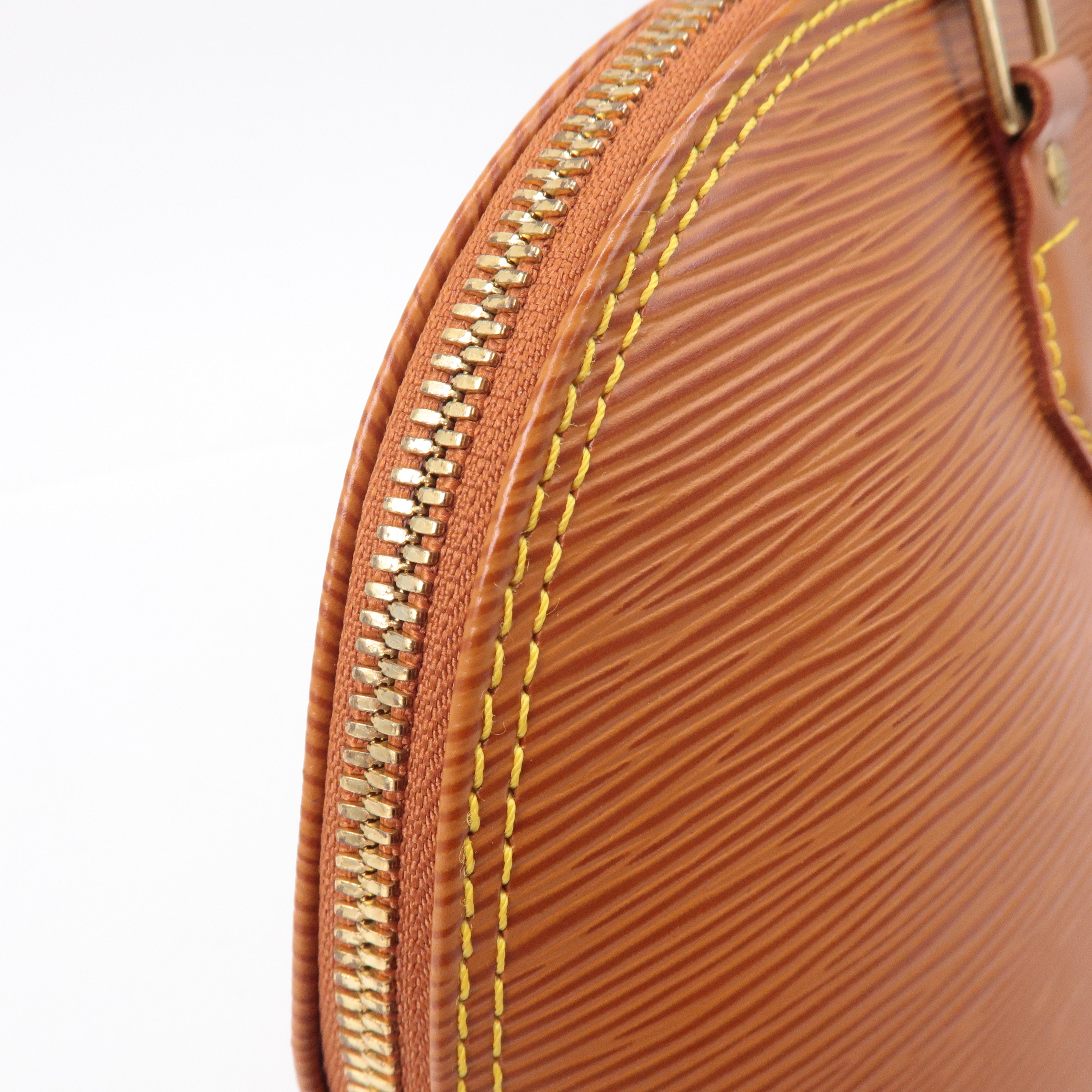 Louis Vuitton Epi Alma Leather Hand Bag Zipangu Gold M52148