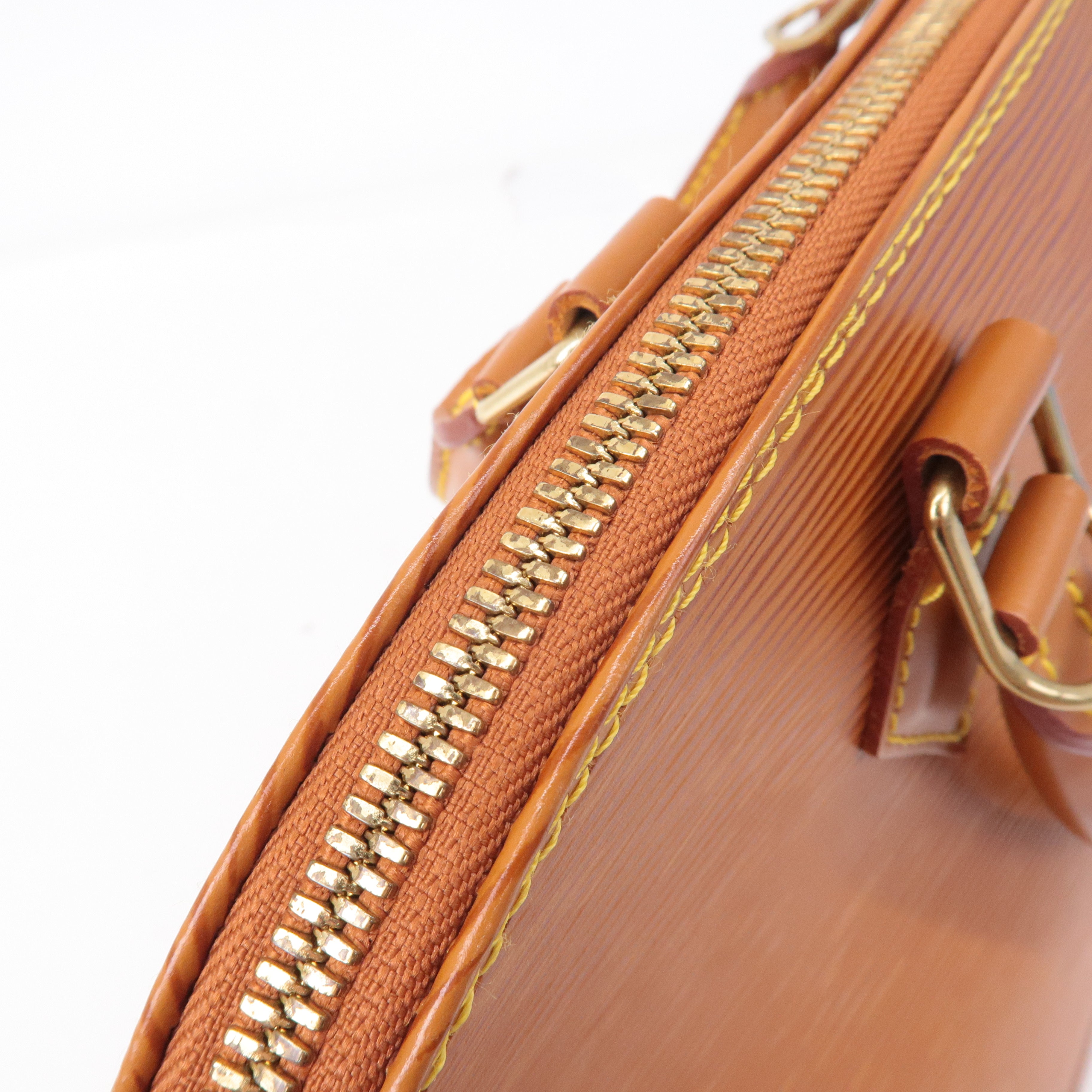 Louis Vuitton Epi Alma Leather Hand Bag Zipangu Gold M52148