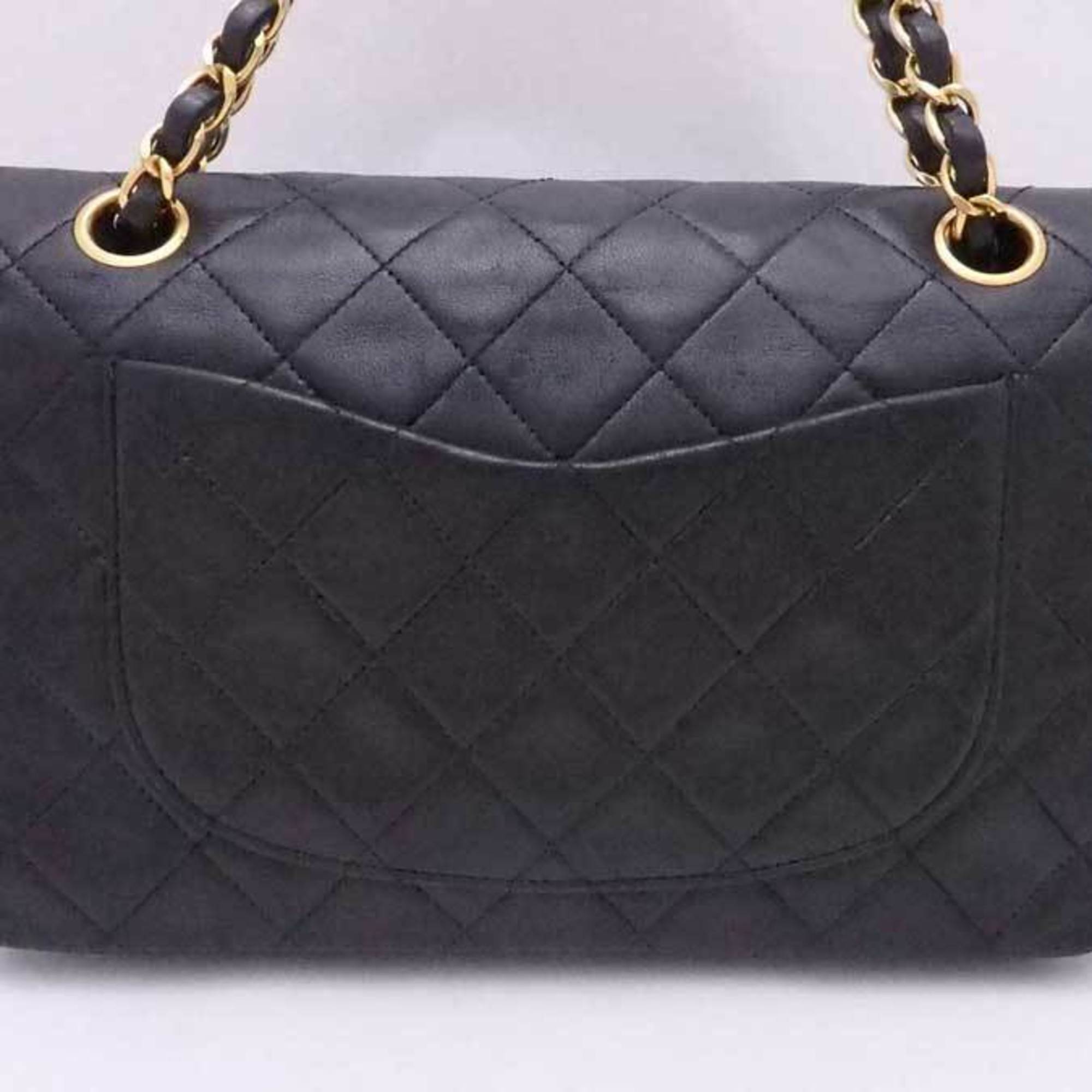 CHANEL shoulder bag matelasse leather / metal black x gold ladies