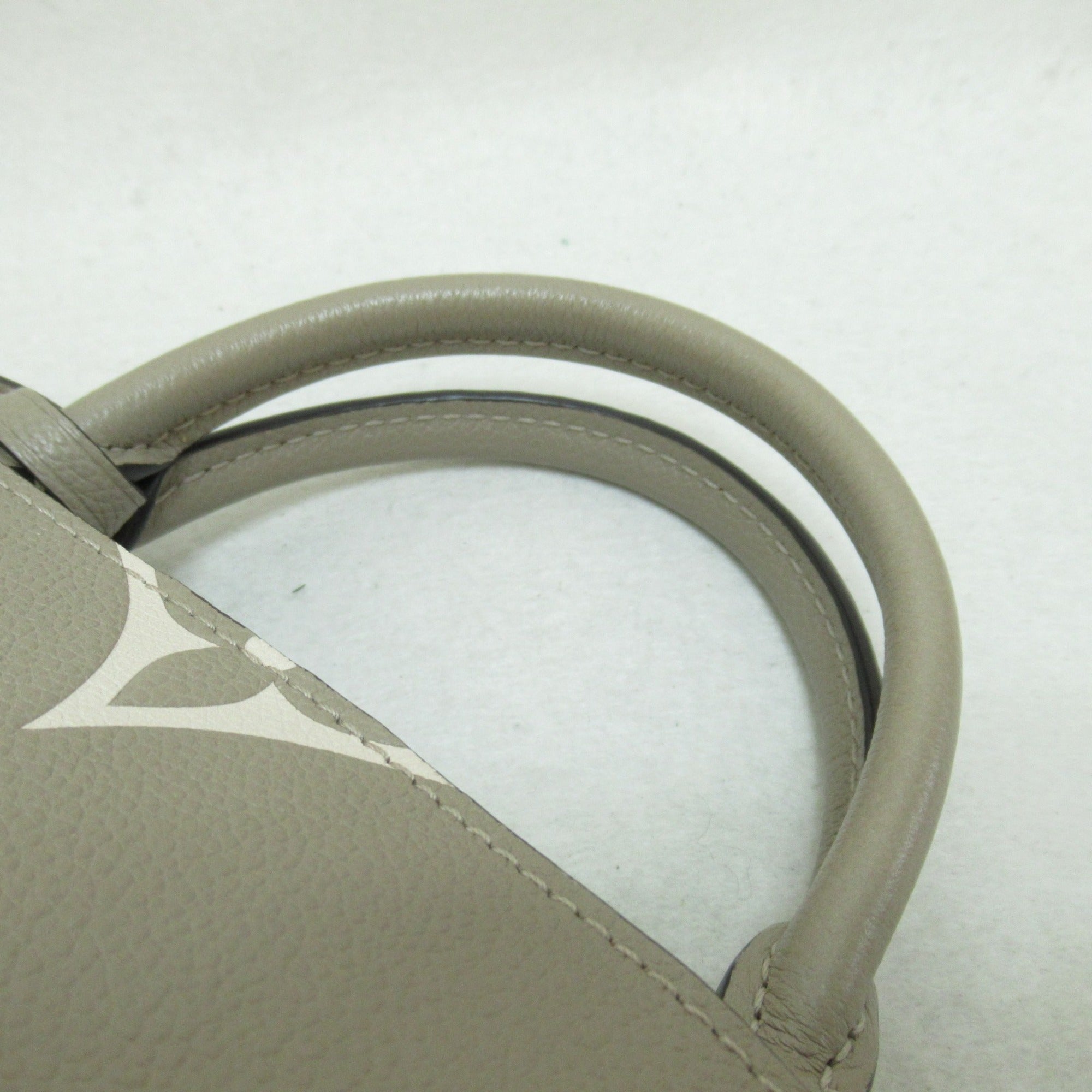 LOUIS VUITTON Petit Palais PM handbag Beige Turtle claim Monogram empreinte leather M58914