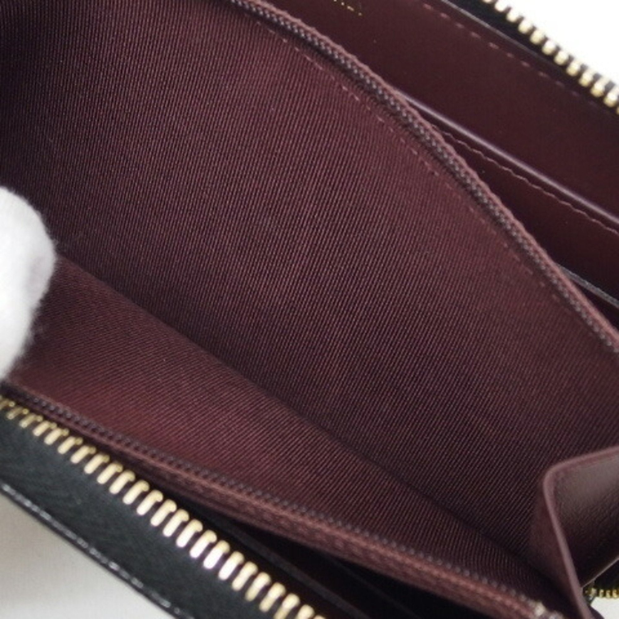 CHANEL Matelasse round long wallet caviar skin