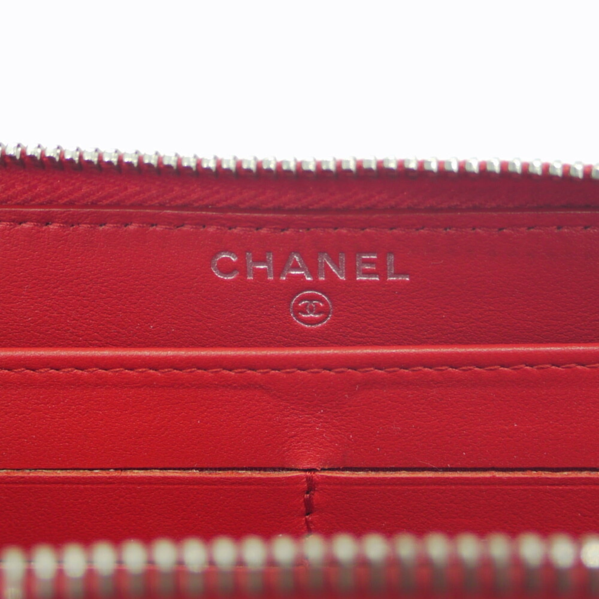 CHANEL camellia embossed round long wallet lambskin red A82281