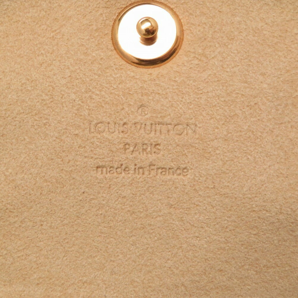 LOUIS VUITTON Monogram Pochette Cancun Shoulder Bag M60