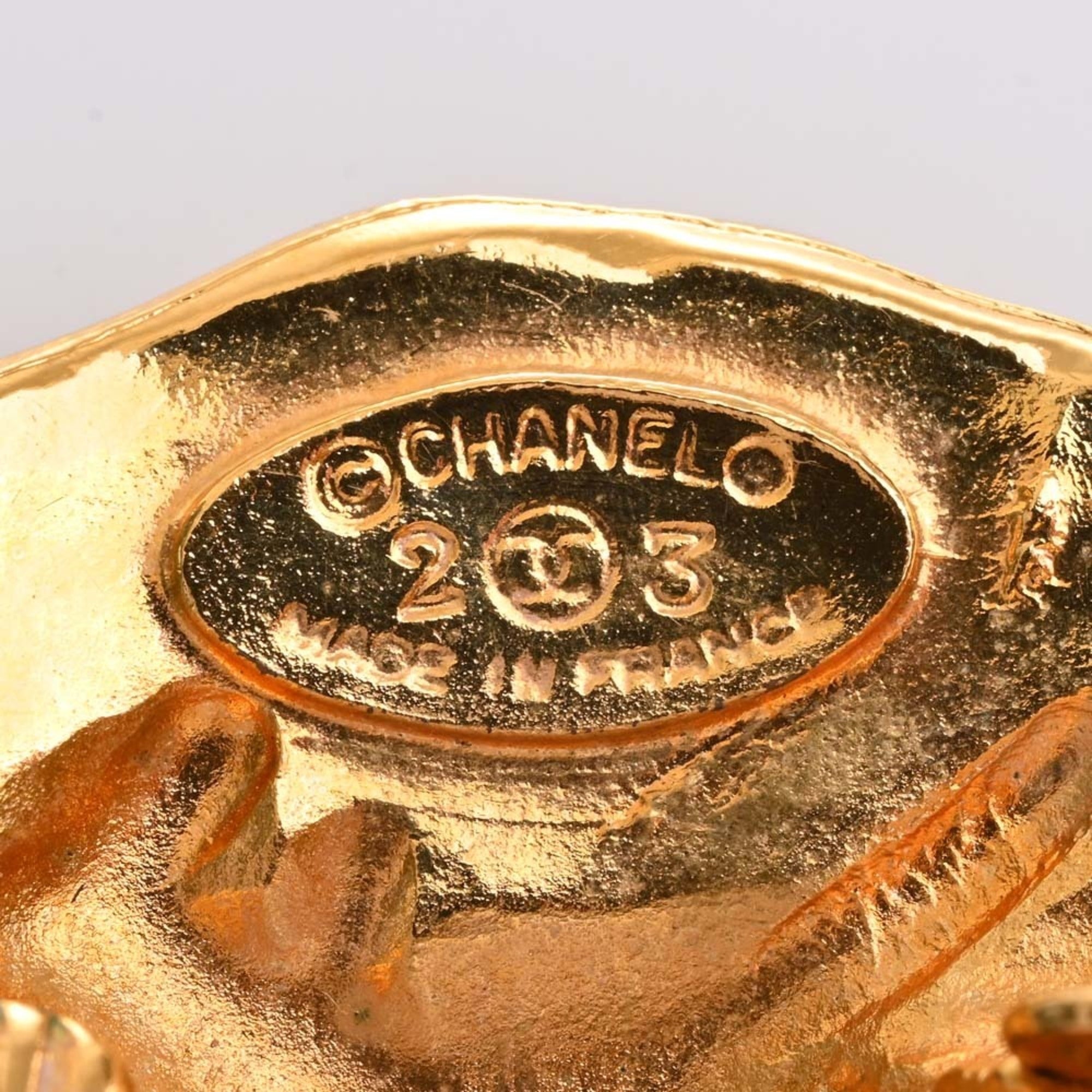 CHANEL lion motif earrings gold ladies