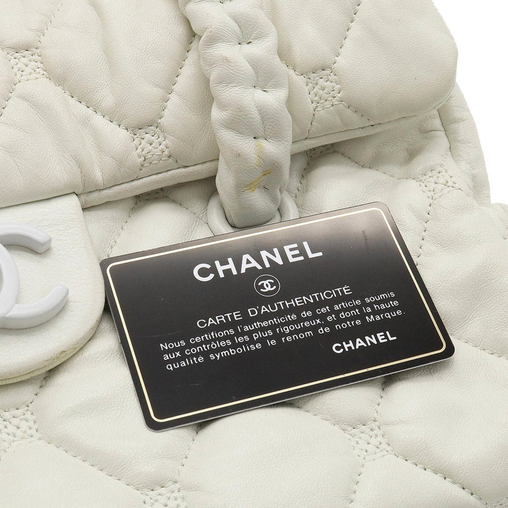 CHANEL here mark handbag leather white