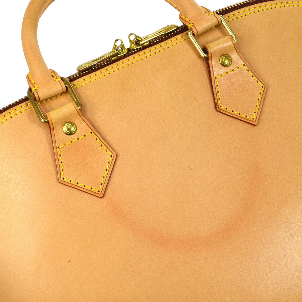 LOUIS VUITTON ALMA NATURAL NOMADE