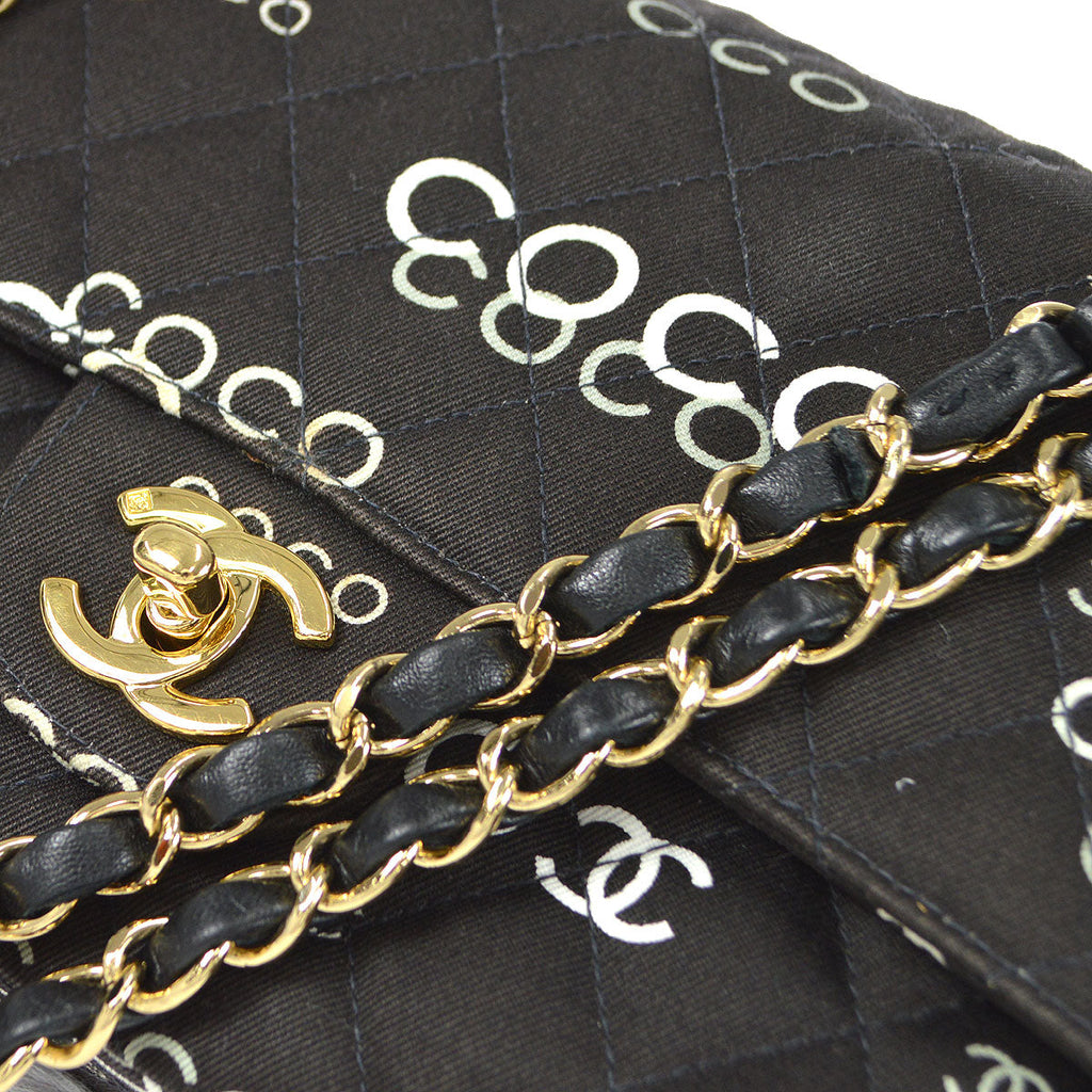 CHANEL 2001-2003 COCO patterned Classic Double Flap Medium Black Canvas 47523