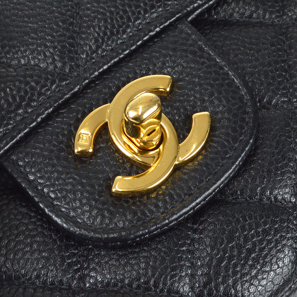 CHANEL 1994 Classic Flap Handbag Medium Black Caviar 78302