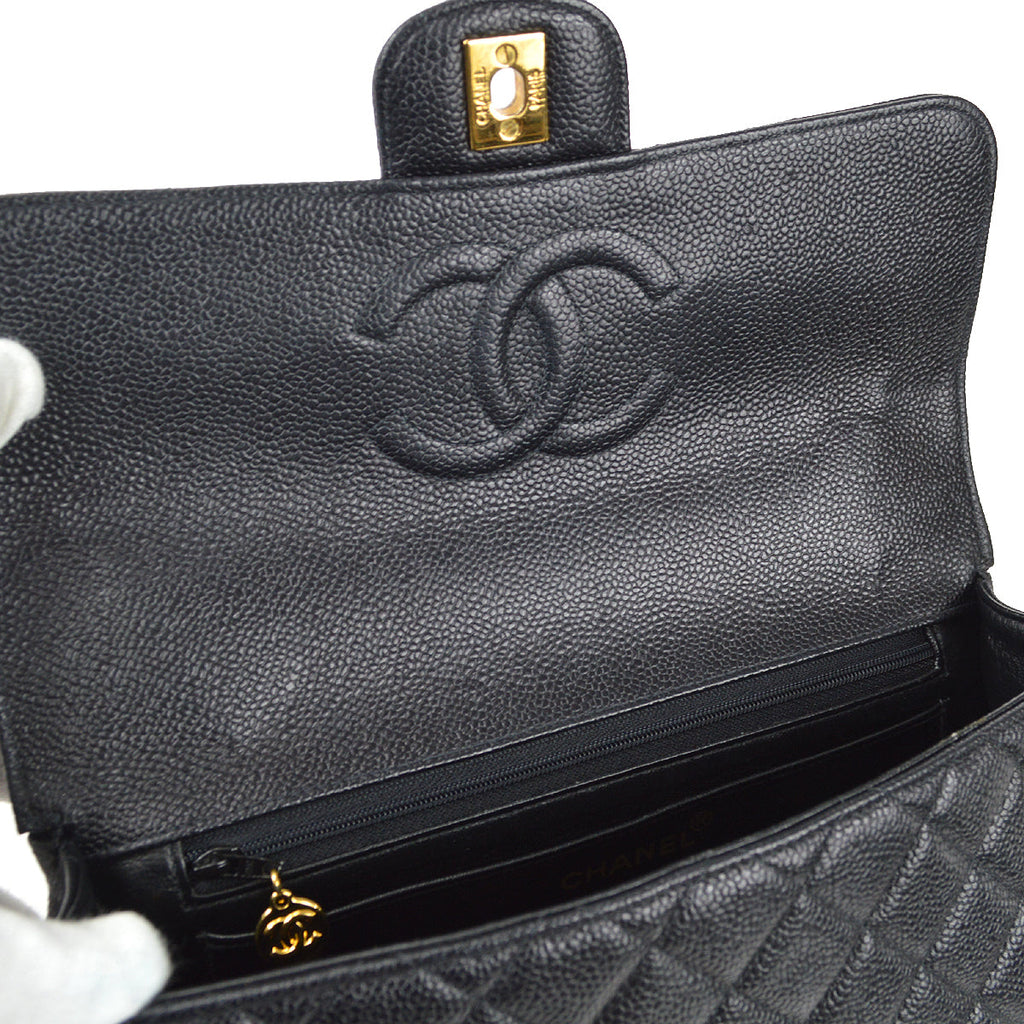CHANEL 1994 Classic Flap Handbag Medium Black Caviar 78302
