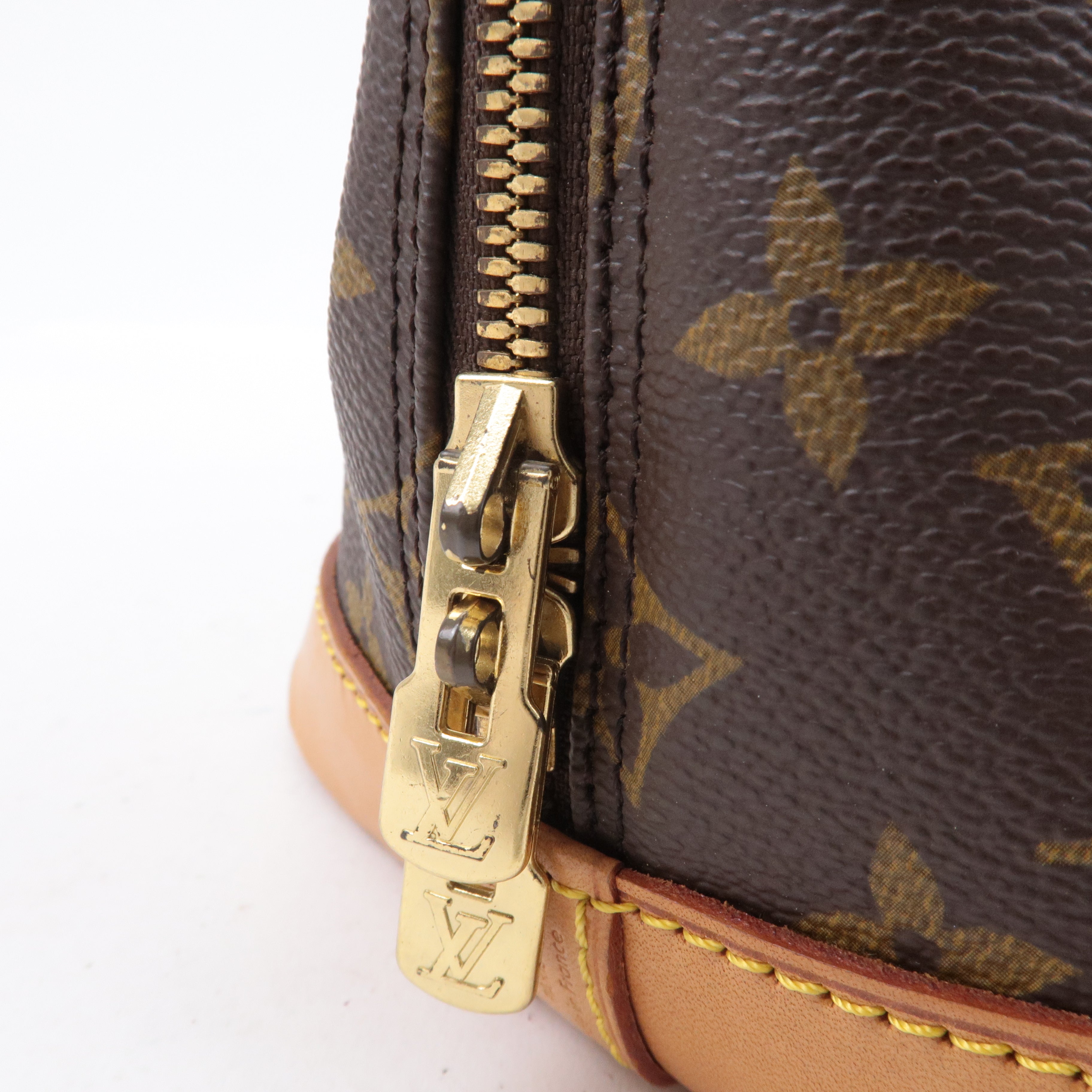 Louis Vuitton Monogram Alma Hand Bag Brown M51130