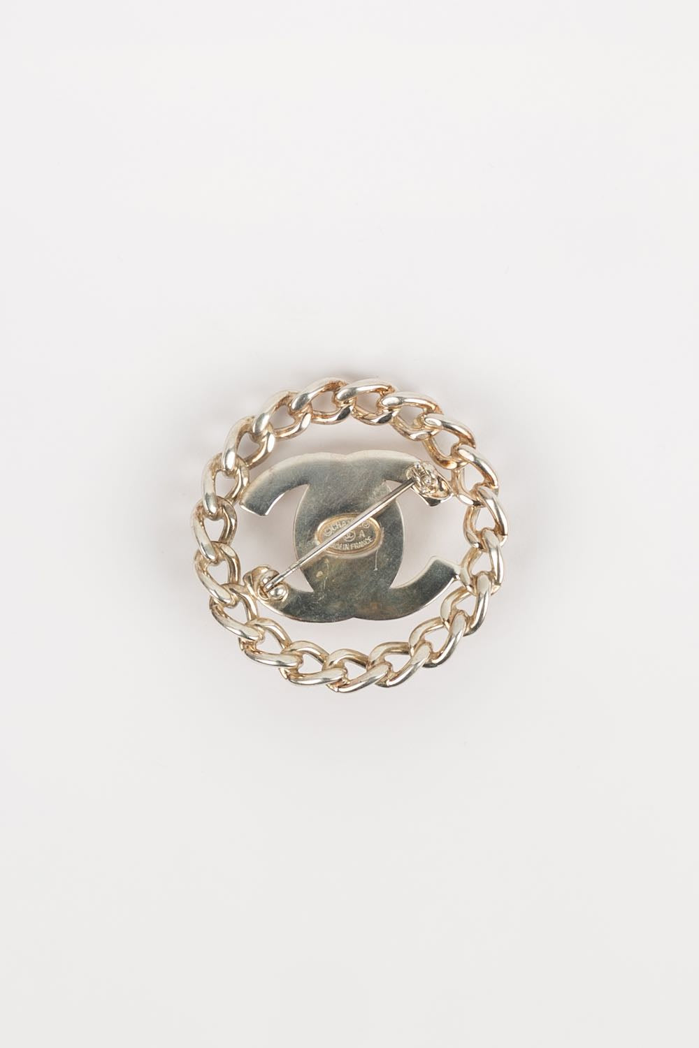 Broche tourniquet Chanel 1997