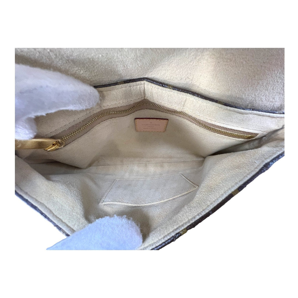 Louis Vuitton Monogram Etoile Clutch