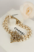Collier cam��lia Chanel