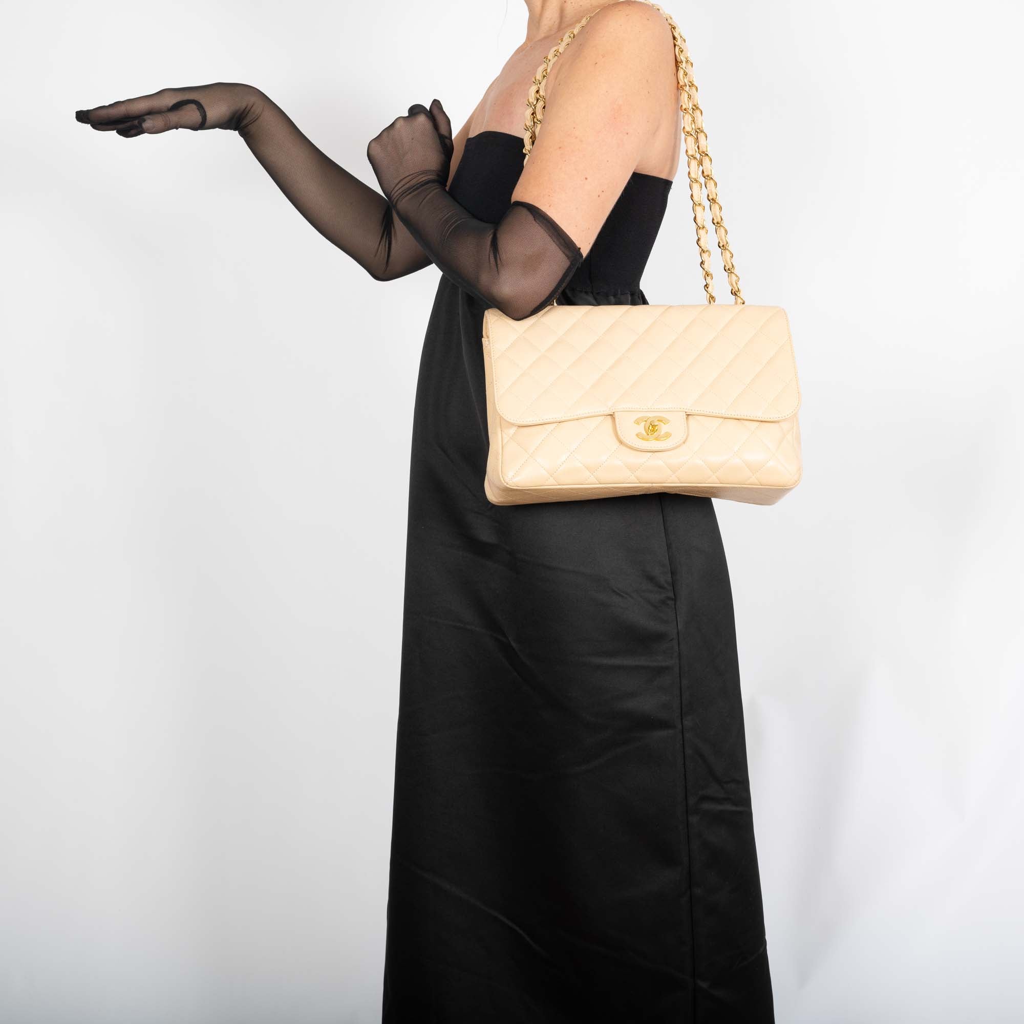 Chanel Classic Jumbo Single Flap Beige Quilted Caviar Gold Hardware