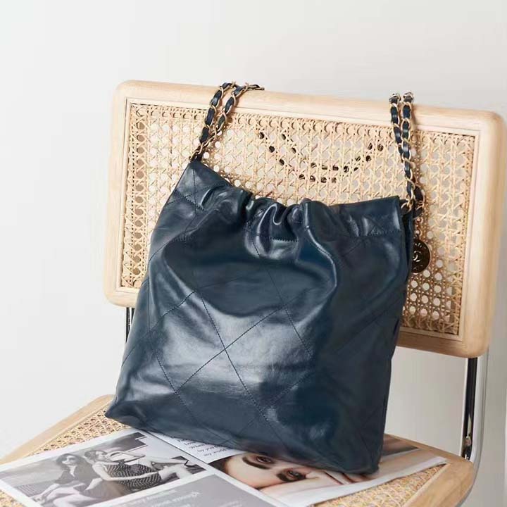 Chanel Women 22 Small Handbag Shiny Calfskin Gold-Tone Metal Navy Blue