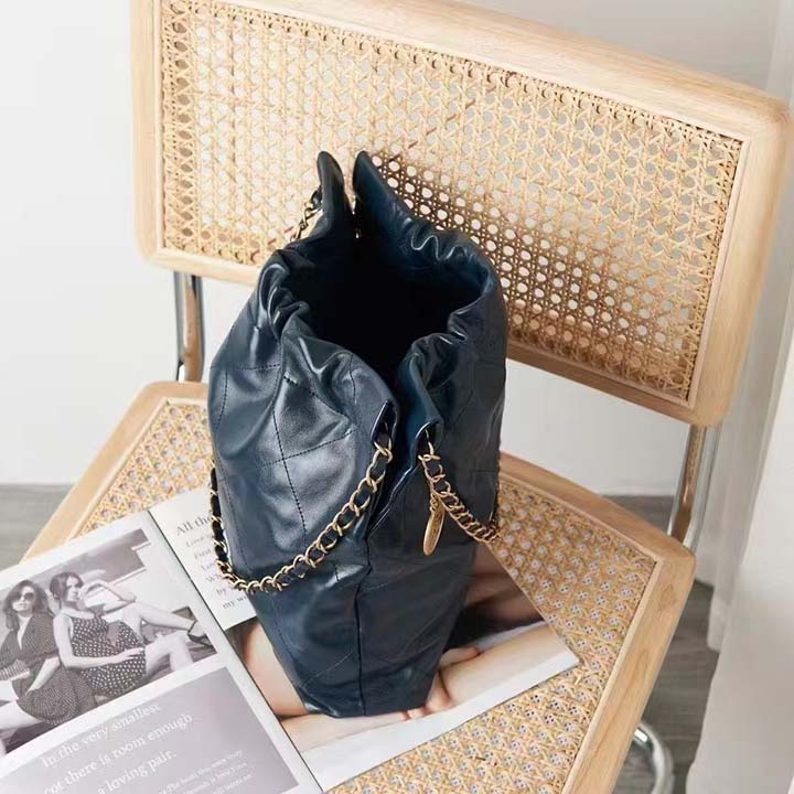 Chanel Women 22 Small Handbag Shiny Calfskin Gold-Tone Metal Navy Blue