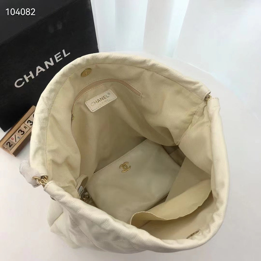Chanel Women 22 Small Handbag Shiny Calfskin & Gold-Tone Metal Beige