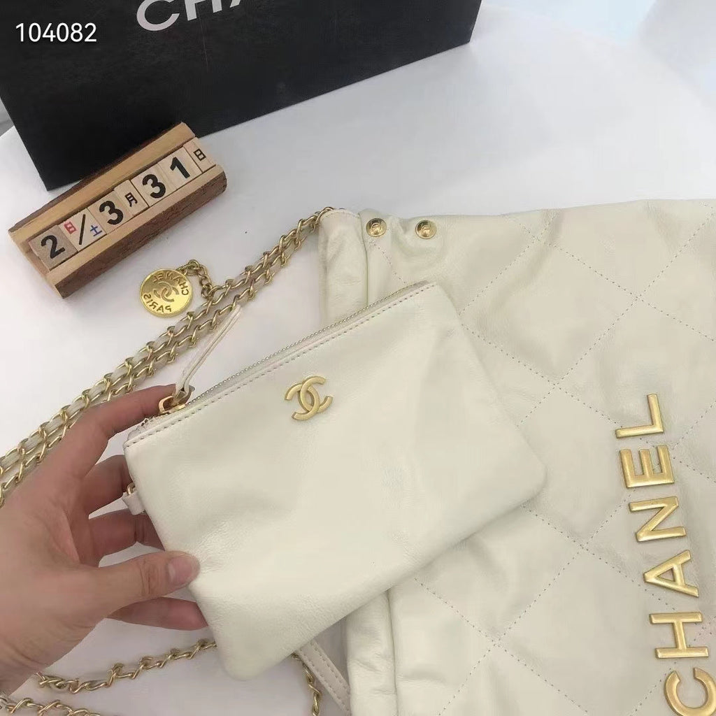 Chanel Women 22 Small Handbag Shiny Calfskin & Gold-Tone Metal Beige