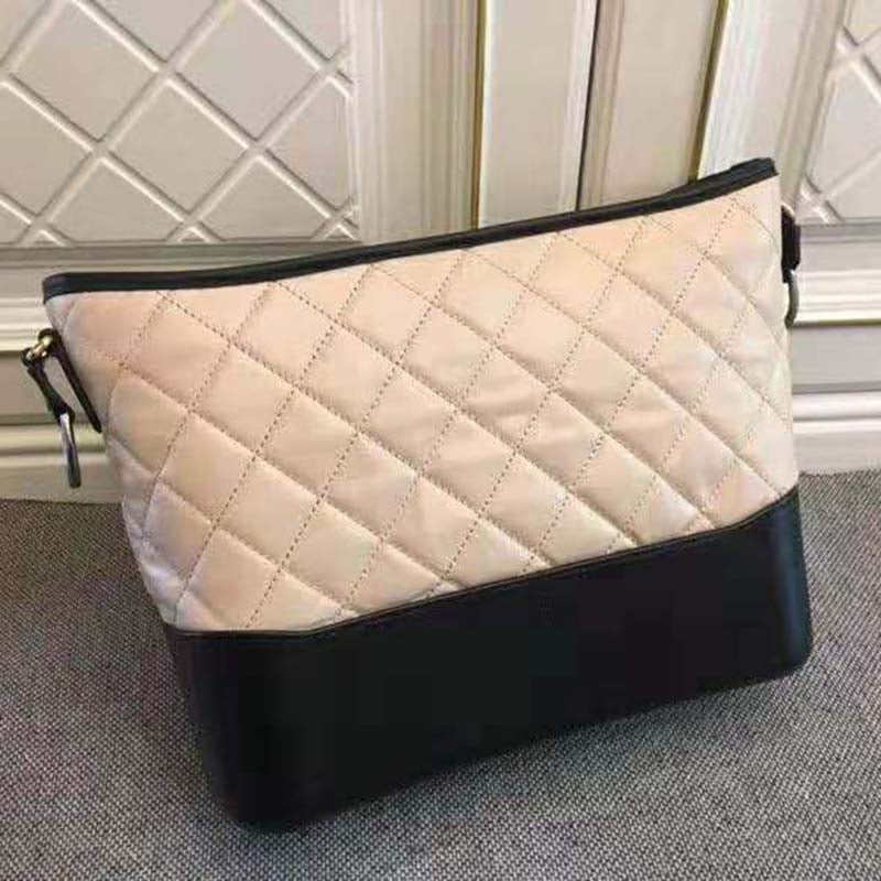 Chanel Women Chanel’s Gabrielle Large Hobo Bag in Calfskin Leather-Beige
