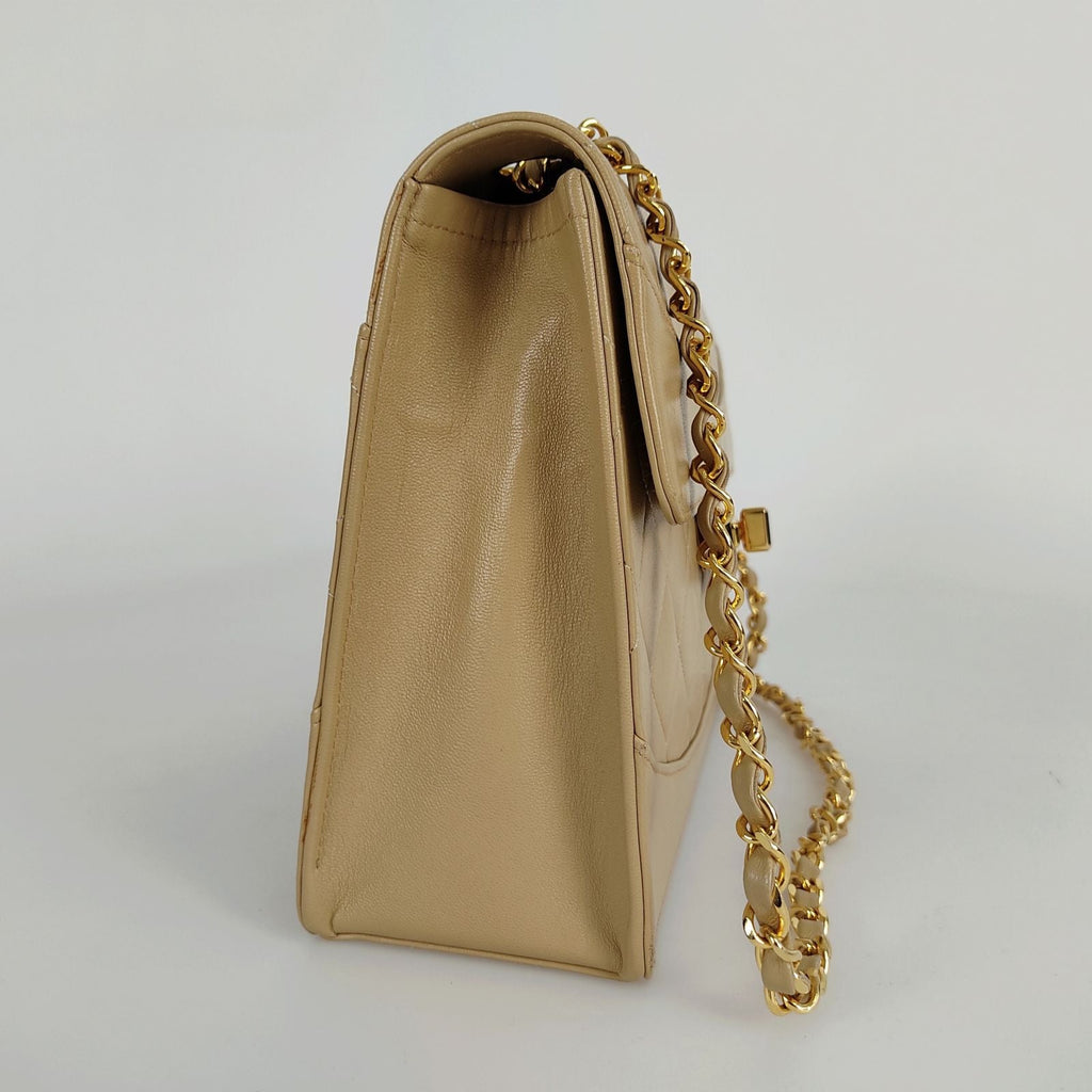 CHANEL Timeless Classica turn lock bag in beige leather