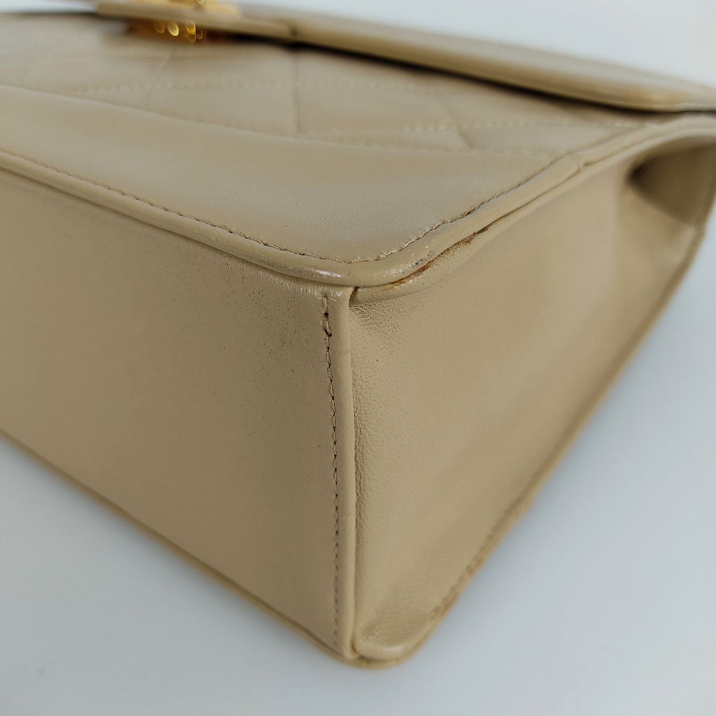 CHANEL Timeless Classica turn lock bag in beige leather