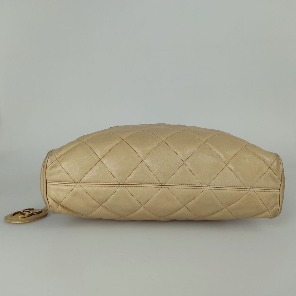 CHANEL shoulder bag in beige matelasse leather from the 80s