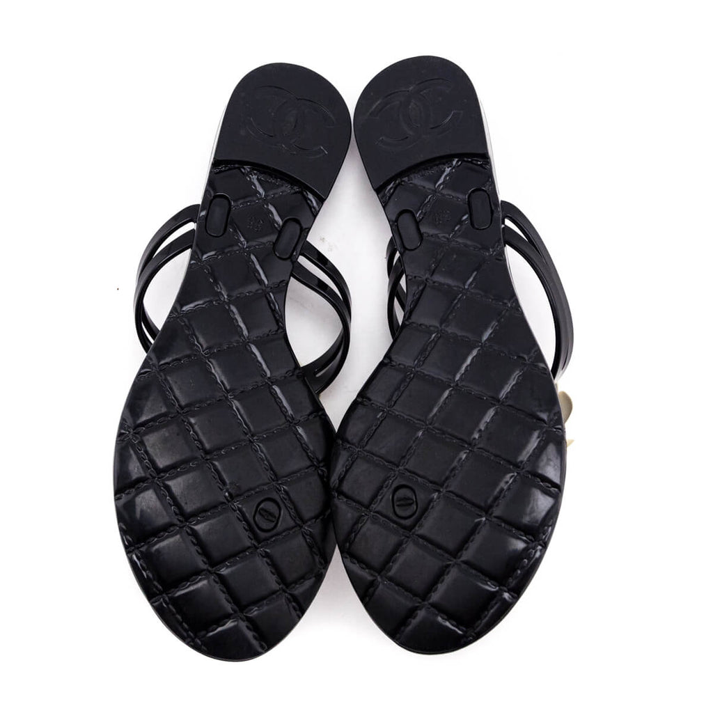 Chanel Black & Ivory Camellia Jelly Sandals Size US 8 | EU 38