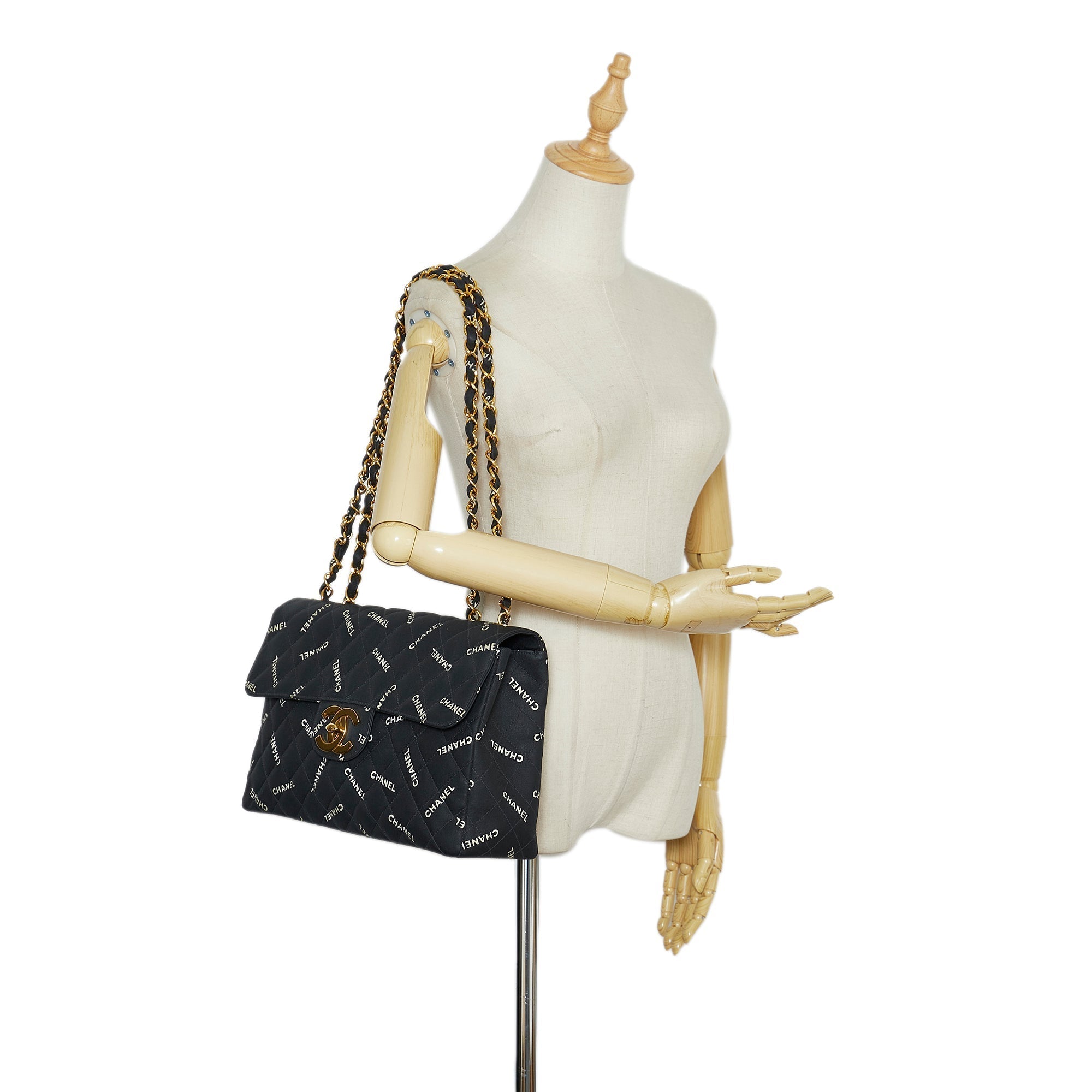 CHANEL Maxi Logo Printed CC Matelasse Flap Bag
