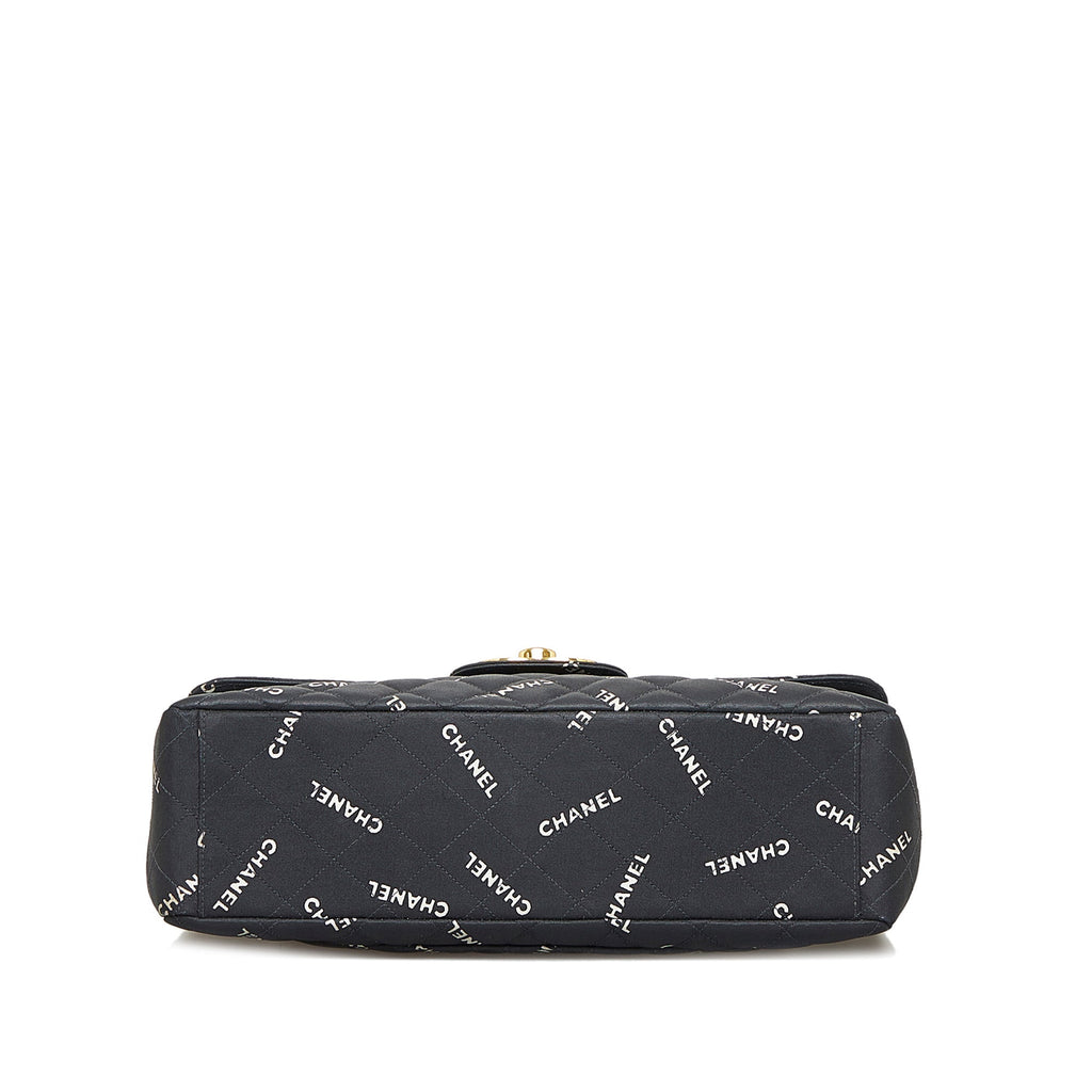 CHANEL Maxi Logo Printed CC Matelasse Flap Bag