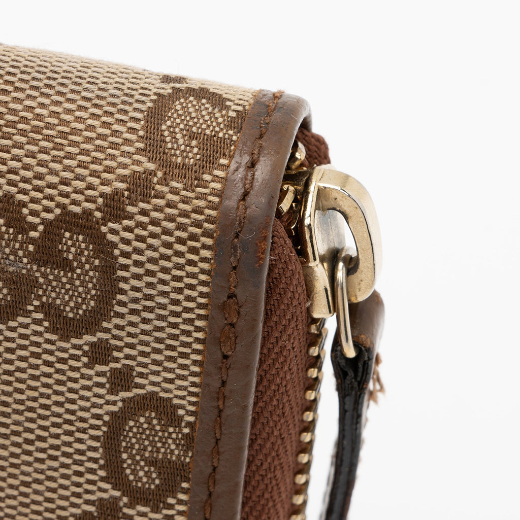 Gucci GG Canvas Zip Around Wallet (SHF-UhAy8j)