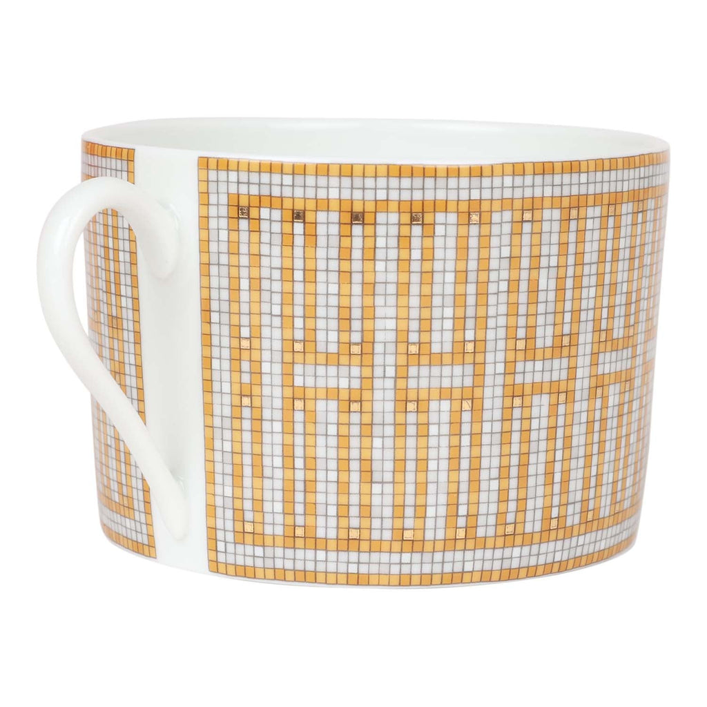 Hermes "Mosaique Au 24" Gold Porcelain Tea Cup And Saucer Set