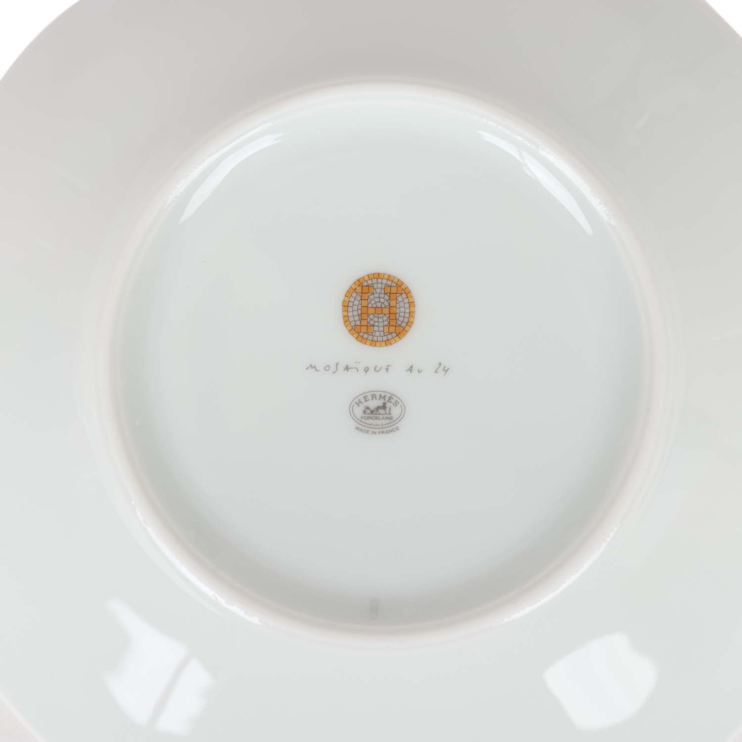 Hermes "Mosaique Au 24" Gold Porcelain Tea Cup and Saucer Set