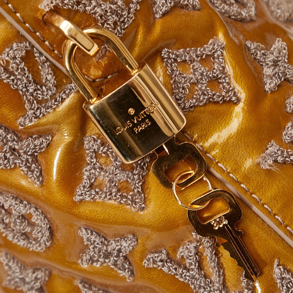 LOUIS VUITTON Monogram Fascination Lockit Handbag