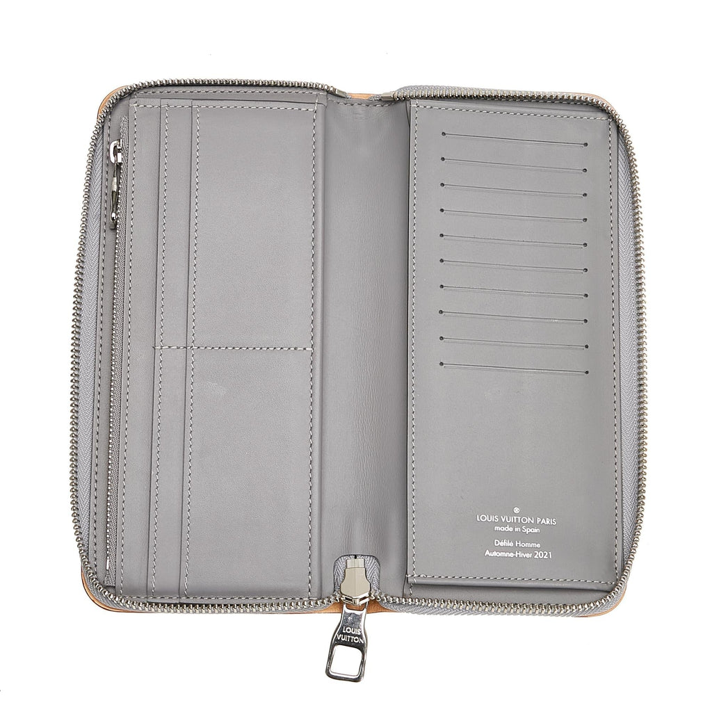Louis Vuitton Monogram Mirror Vertical Zippy (SHG-HMSpUY)