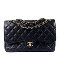 CHANEL Jumbo Classic Caviar Double Flap Shoulder Bag