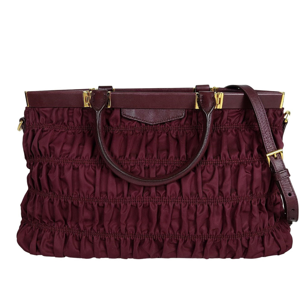 PRADA Gaufre shoulder bag in burgundy nylon and leather trim