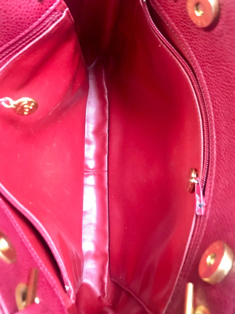 CHANEL Vintage cherry red caviar leather quilted shoulder bag, tote with golden CC ball and chain straps