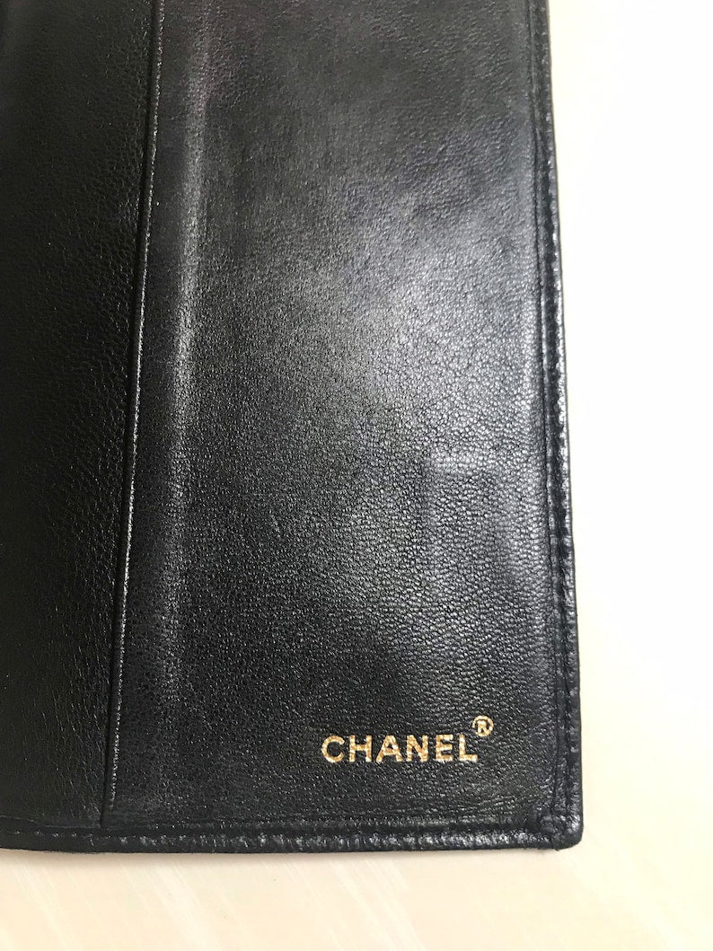 CHANEL Vintage black stitched leather book cover, diary cover, checkbook case etc