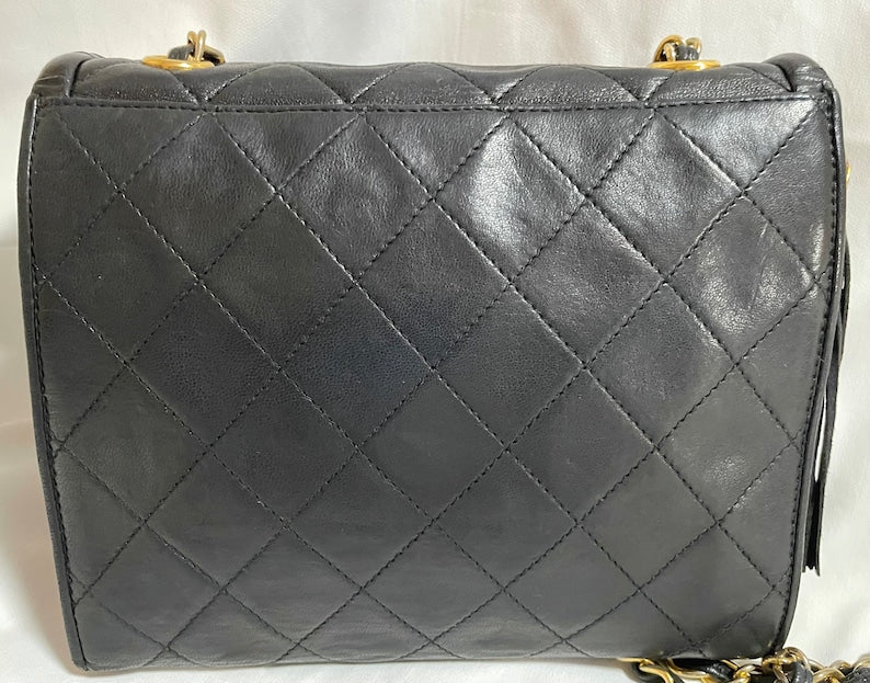 CHANEL Vintage black fringe camera bag with double flaps