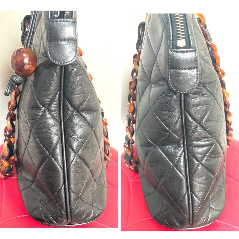 CHANEL Vintage black lambskin large tote bag with brown plastic chains and CC mark charm to the LAMPO zipper