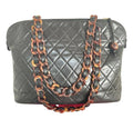 CHANEL Vintage black lambskin large tote bag with brown plastic chains and CC mark charm to the LAMPO zipper