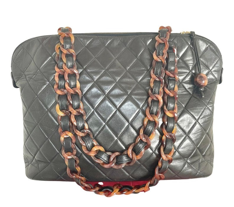 CHANEL Vintage black lambskin large tote bag with brown plastic chains and CC mark charm to the LAMPO zipper