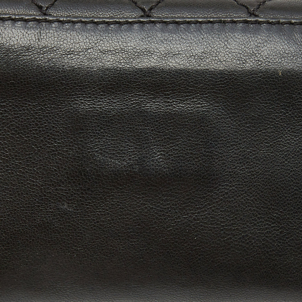 CHANEL Black Quilted Leather Mademoiselle Flap Clutch