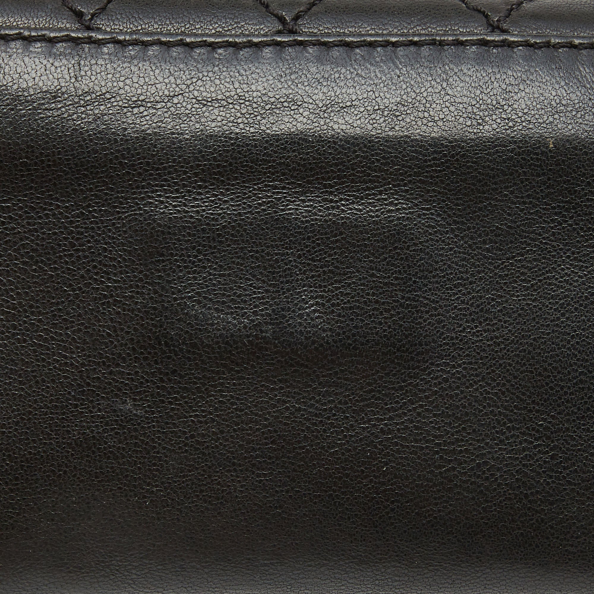 CHANEL Black Quilted Leather Mademoiselle Flap Clutch