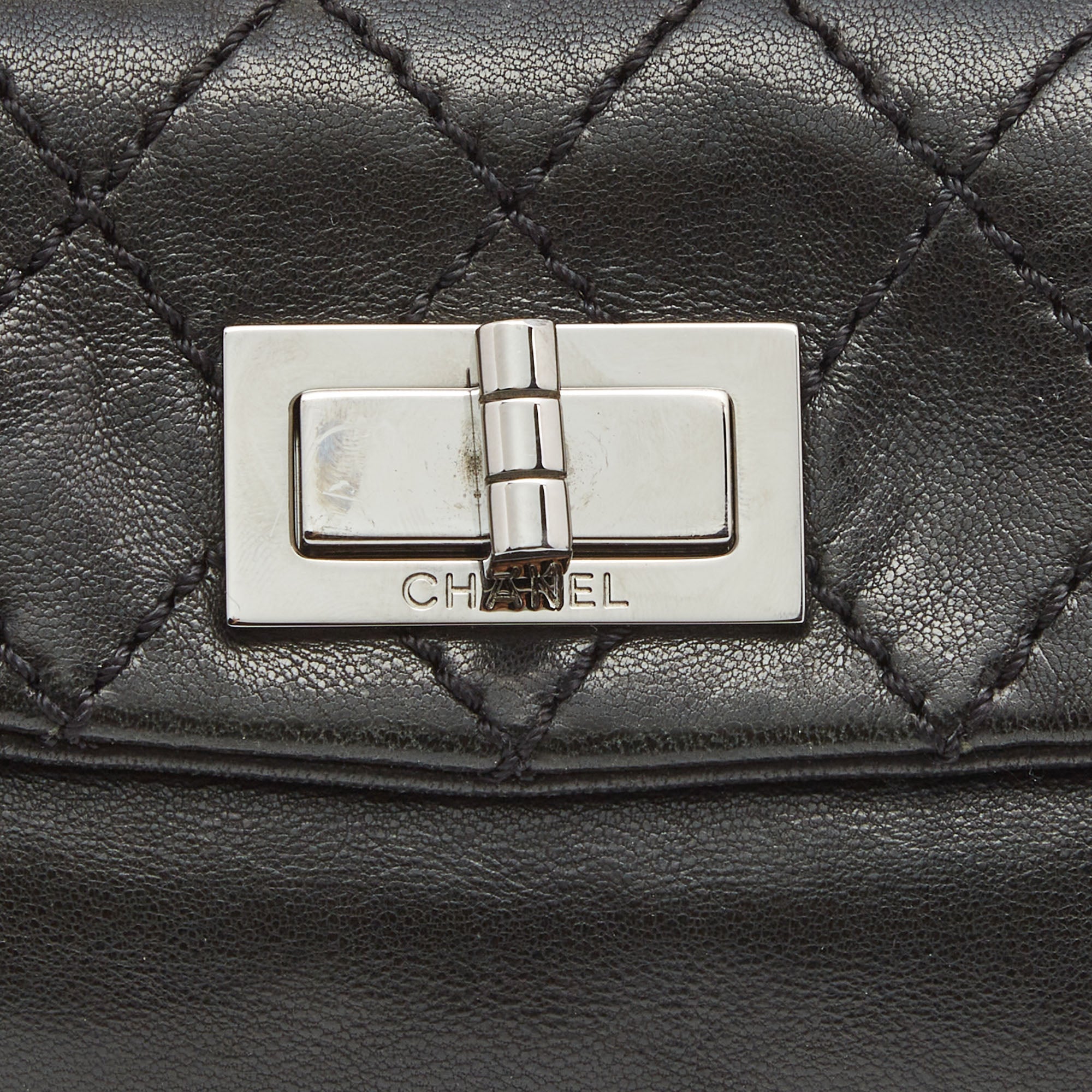 CHANEL Black Quilted Leather Mademoiselle Flap Clutch