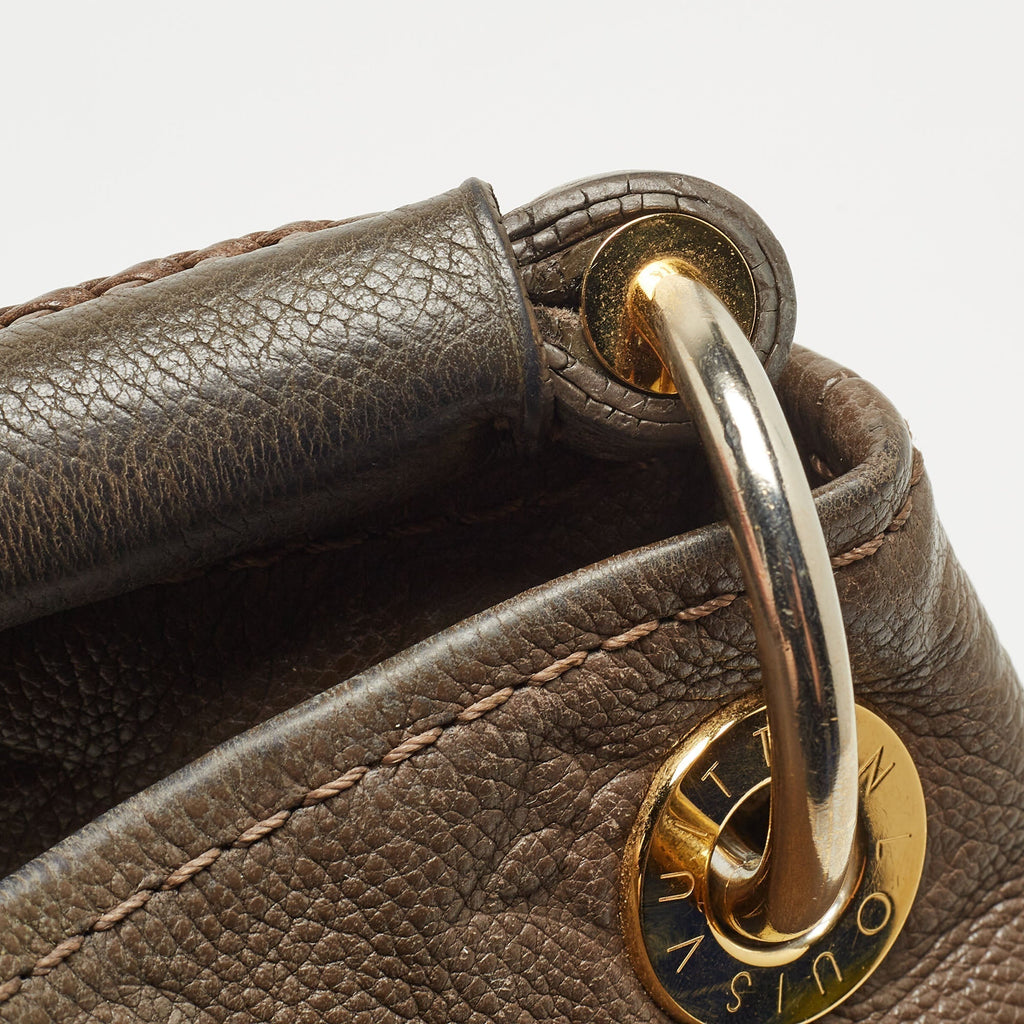 LOUIS VUITTON Terre Monogram Empreinte Leather Artsy MM Bag